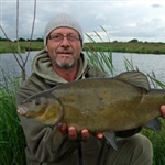 Neale_Gray_with_big_specimen_lake_tench.jpg
